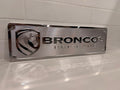 Brisbane Broncos machined supporter plate — raw machined aluminium