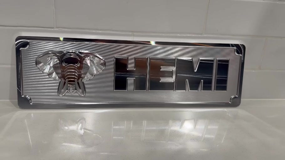 HEMI CNC machined display plate — black anodised with post-machined highlights