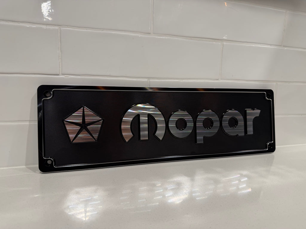 Mopar CNC machined display plate — black anodised detail